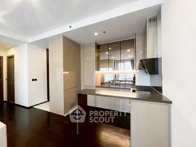 Modern kitchen with sleek cabinetry and open layout design