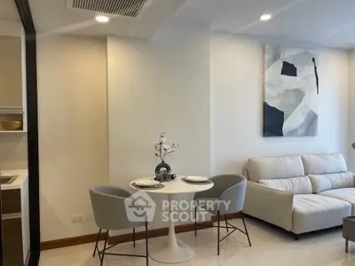 Modern living room with elegant decor and cozy seating area
