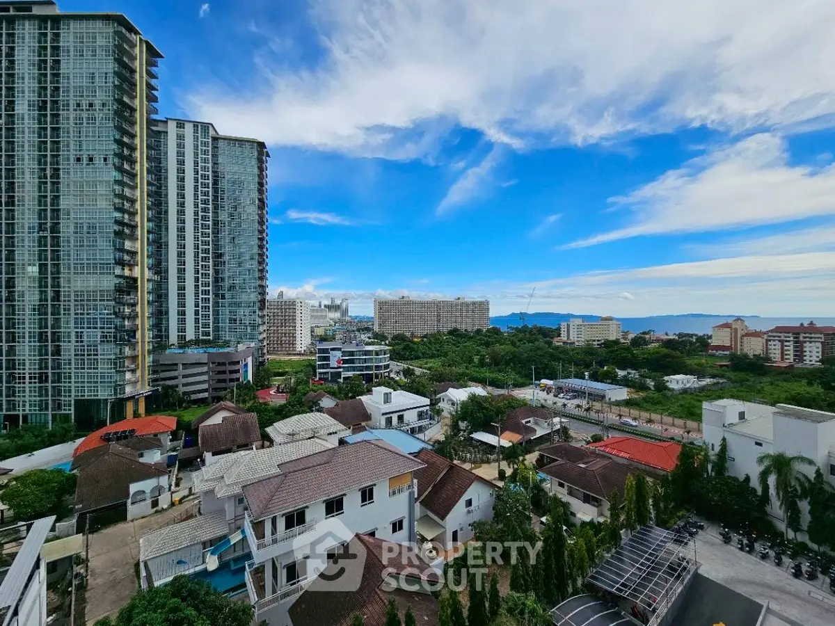 Stunning cityscape view from high-rise building with clear blue sky