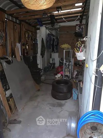 Spacious garage with ample storage and potential for customization.