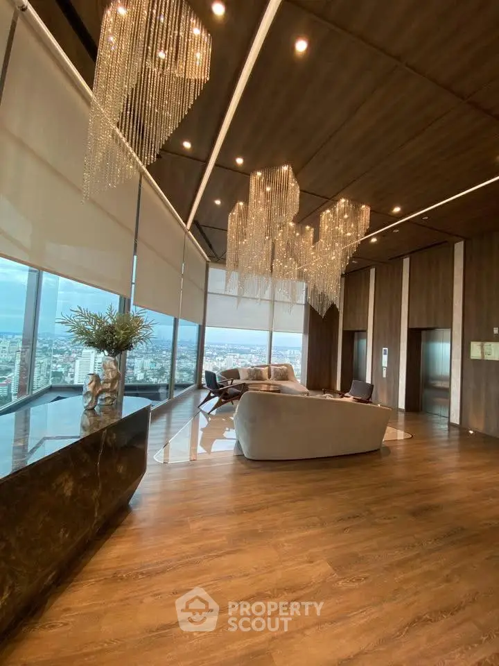 Luxurious living room with panoramic city view and elegant chandeliers