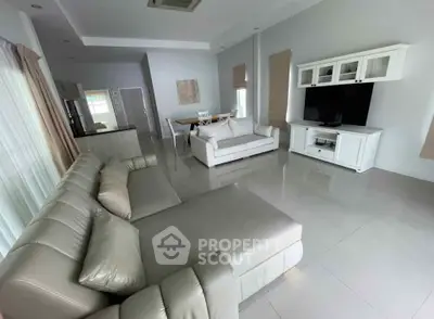 Spacious modern living room with elegant furniture and open layout