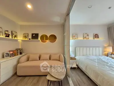 Modern bedroom with stylish decor and cozy seating area