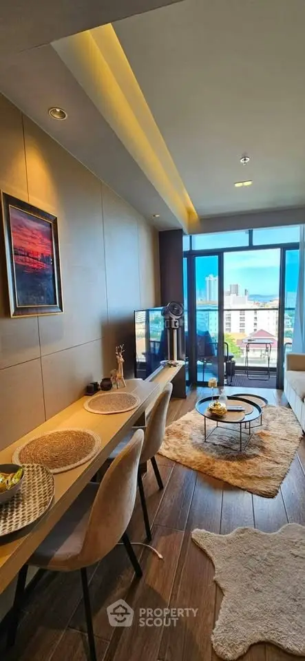 Modern living room with stylish decor and city view from large windows