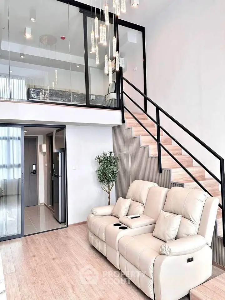 Modern duplex living room with stylish staircase and elegant lighting