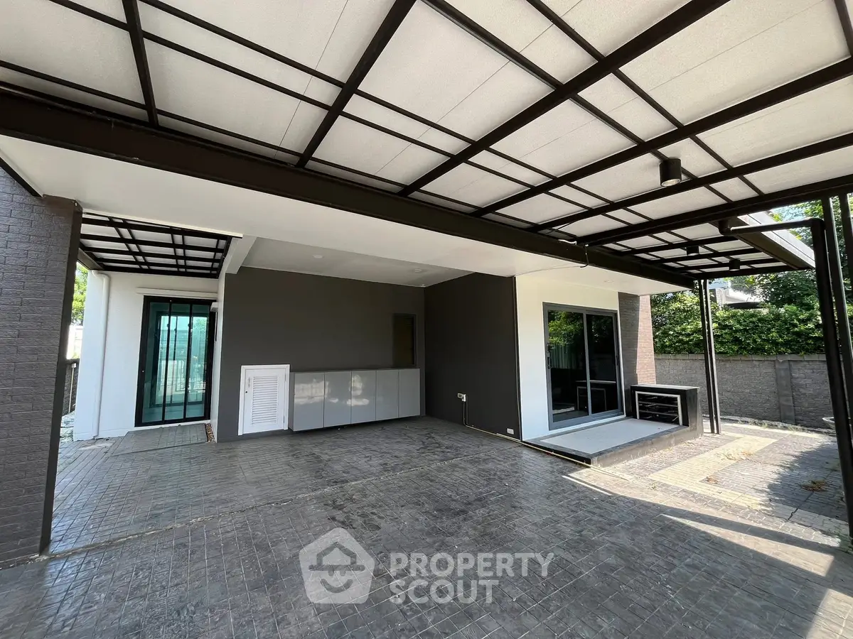 Modern covered parking area with sleek design and spacious layout