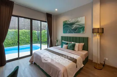 Luxurious bedroom with pool view, elegant decor, and floor-to-ceiling windows in modern home.