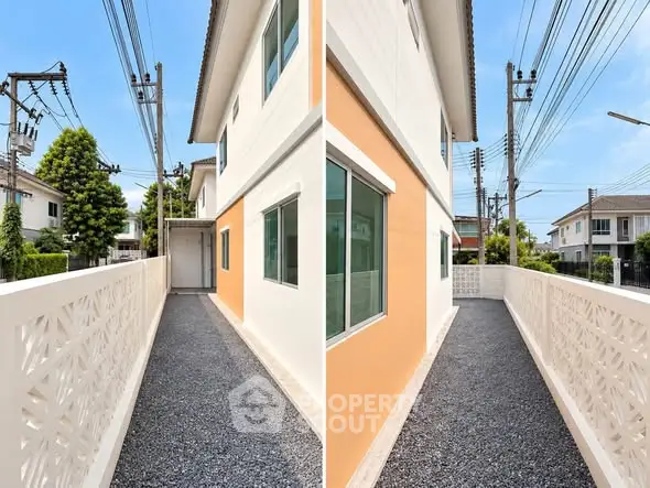 Modern residential building exterior with clean walkway and vibrant facade.