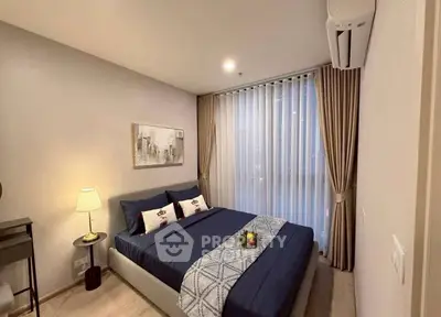 Cozy modern bedroom with elegant decor and soft lighting