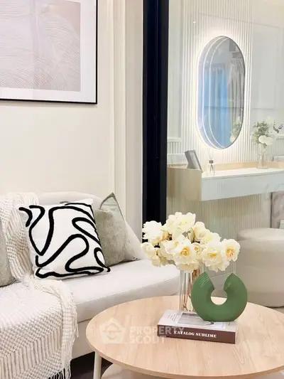 Stylish living room with modern decor and elegant bathroom view