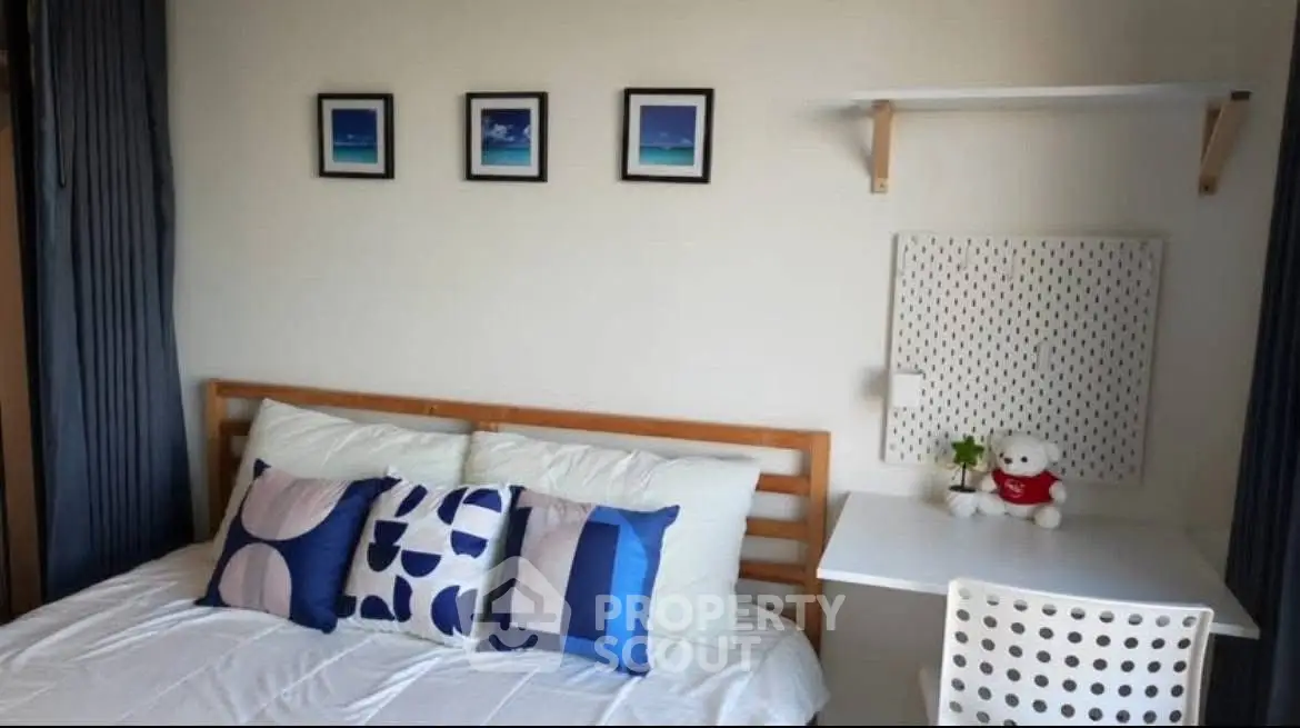 Cozy bedroom with modern decor and stylish wall art