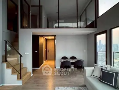 Modern duplex apartment with mezzanine bedroom and city view