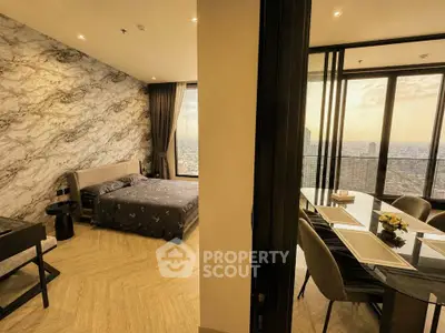 Luxurious apartment with stunning city view, featuring elegant bedroom and dining area with modern decor.