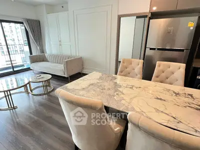 Elegant modern living room with marble dining table and balcony view