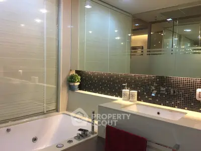 Luxurious modern bathroom with bathtub and elegant fixtures