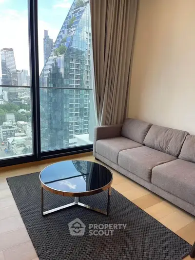 Modern living room with stunning city view and sleek furniture in high-rise apartment.
