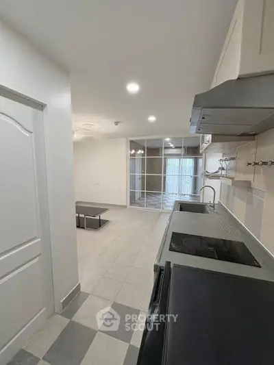 Modern kitchen with sleek design and open layout in a contemporary home