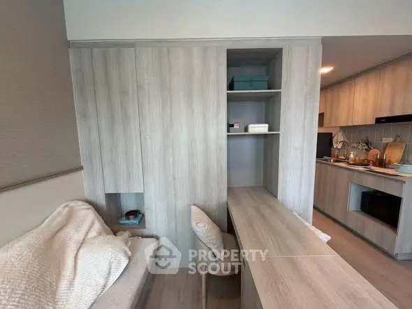Modern apartment interior with cozy living area and sleek kitchen design