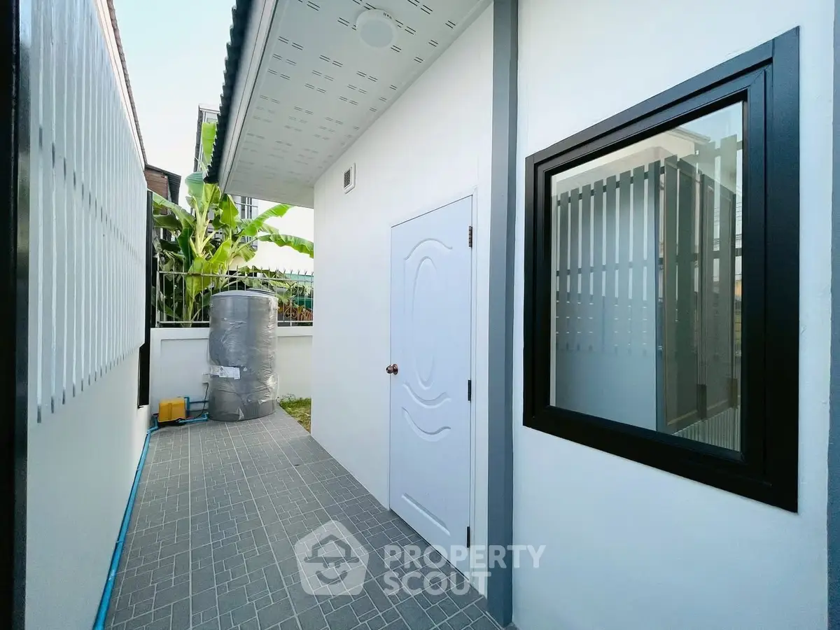 Modern exterior with sleek design and private outdoor space, perfect for contemporary living.
