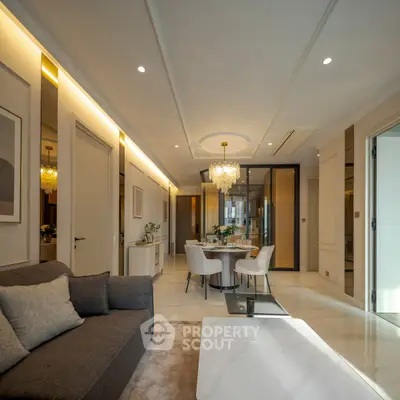 Luxurious modern living room with elegant dining area and chandelier lighting