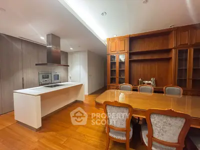 Luxurious kitchen with elegant dining area and modern appliances