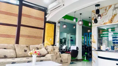 Stylish living room with modern decor and cozy seating area, perfect for relaxation and entertaining.