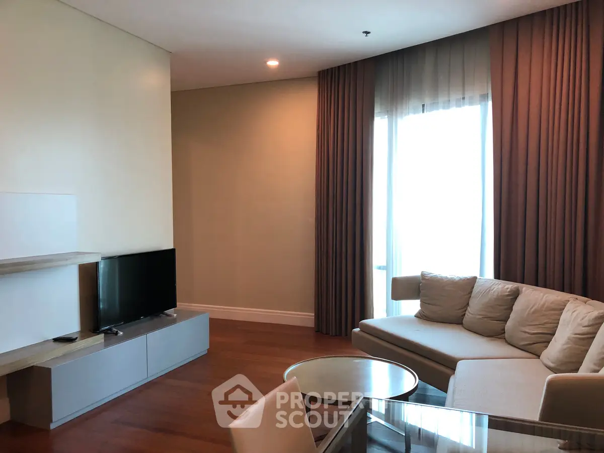 Spacious living room with modern furniture and natural light