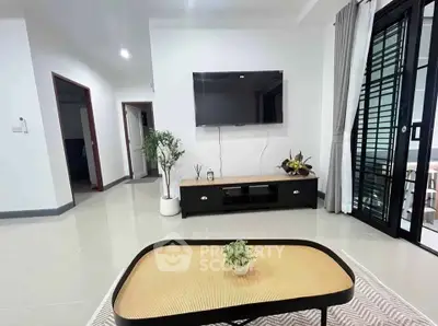 Modern living room with sleek TV setup and stylish decor