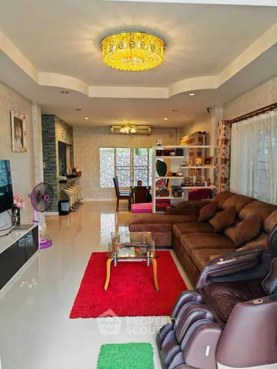 Spacious living room with modern decor and plush seating in a cozy home.