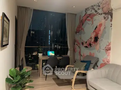 Chic urban living room with stylish furnishings, vibrant wall art, and a captivating city view through large windows, perfect for modern living.