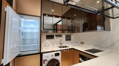 Modern kitchen with sleek appliances and open layout design