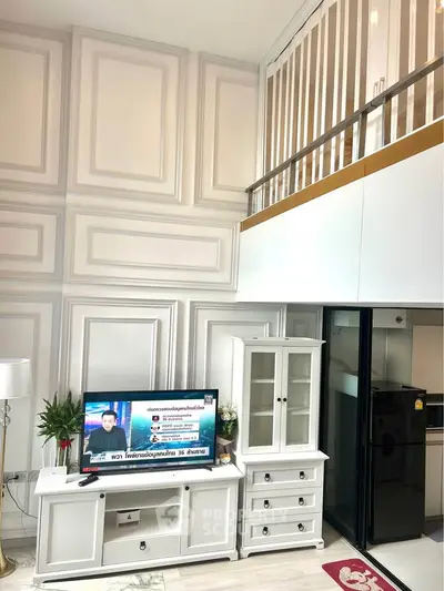 Stylish modern living room with loft and elegant white furniture