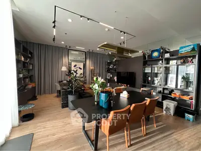 Modern living room with stylish dining area and contemporary decor
