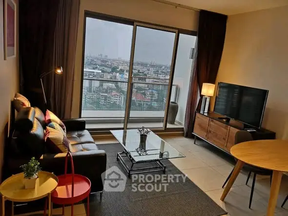 Modern living room with city view, stylish furniture, and large windows.