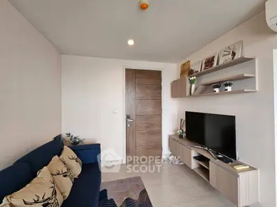 Modern living room with stylish decor and entertainment center