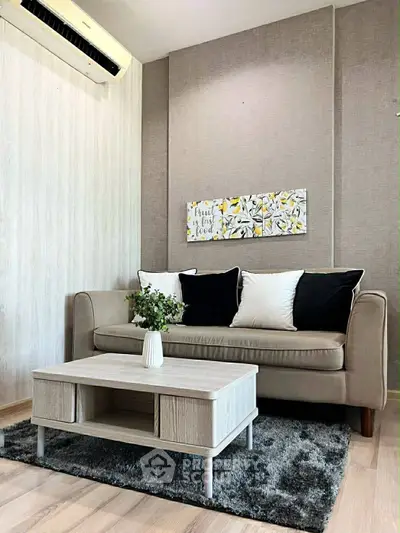 Stylish living room with modern sofa, chic decor, and cozy ambiance perfect for relaxation.