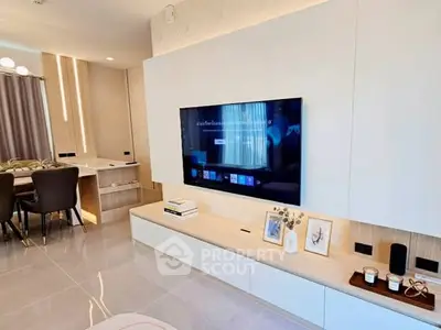 Modern living room with sleek TV setup and elegant decor