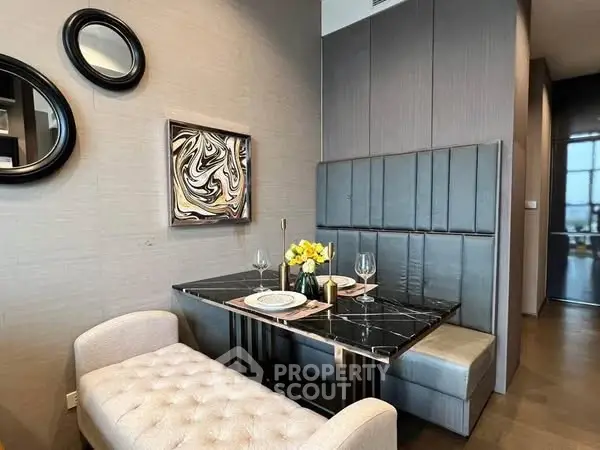 Stylish dining nook with modern decor and plush seating in a contemporary home.