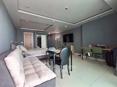 Spacious modern studio apartment with open layout and stylish furnishings