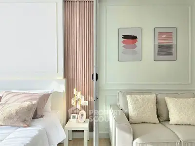 Elegant bedroom and living room with modern decor and pastel accents