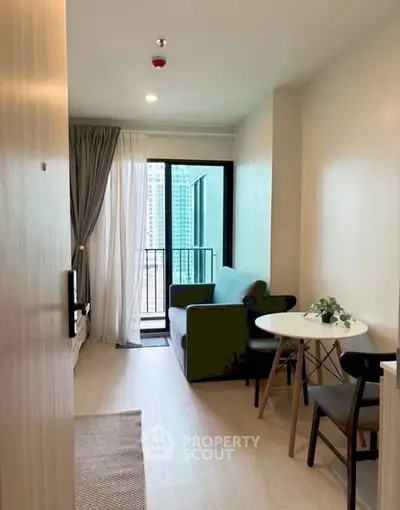 Modern living room with balcony view in urban apartment