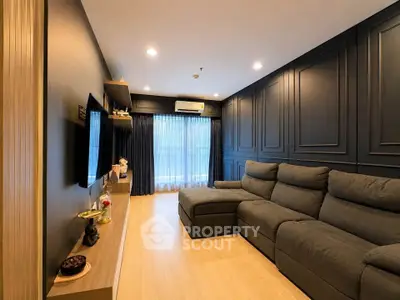 Luxurious modern living room with elegant decor and spacious seating area.