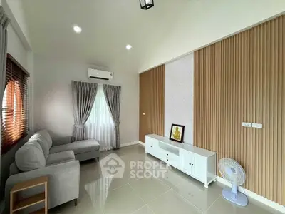 Modern living room with sleek furniture and stylish decor