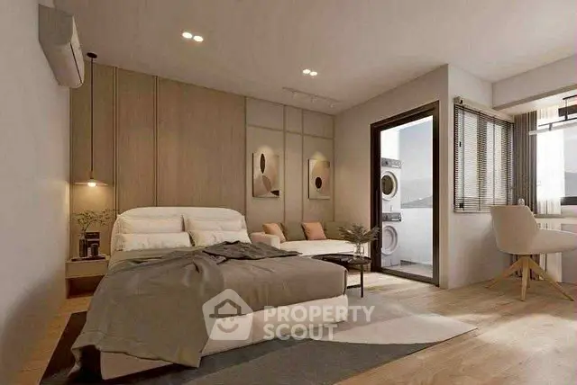 Modern bedroom with stylish decor and natural light, featuring a cozy bed and a small seating area.