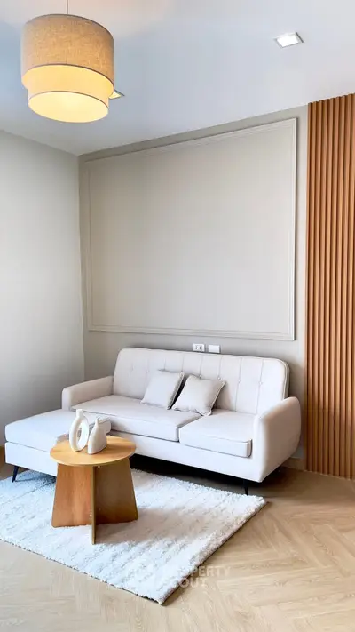 Modern living room with stylish sofa and wooden accents