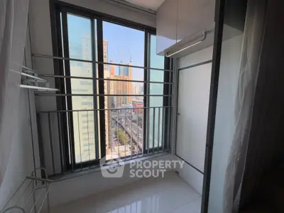 Bright balcony with city view and modern railing design