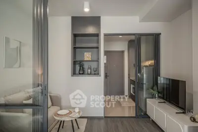 Modern living room with sleek design and open kitchen layout
