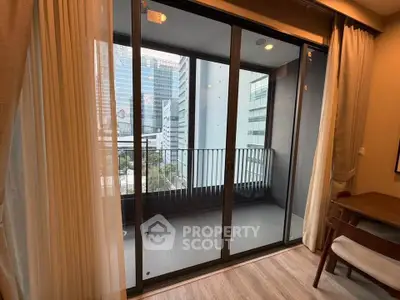 Modern apartment with balcony offering stunning city views, perfect for urban living.
