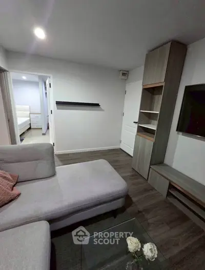 Cozy living room with modern furniture and wooden flooring