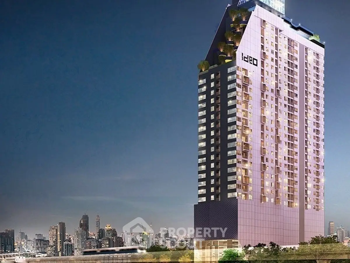 Stunning modern high-rise building with city skyline view, perfect for urban living.